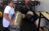 Rochelle loading keg at Strongman Saturdays